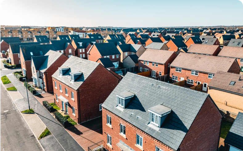 Aerial view of suburban brick houses.